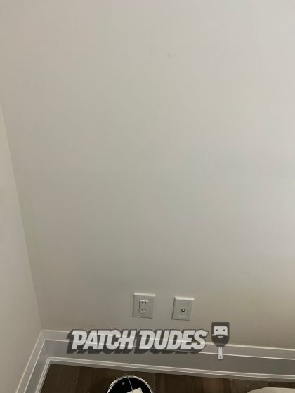 condo wall hole repair