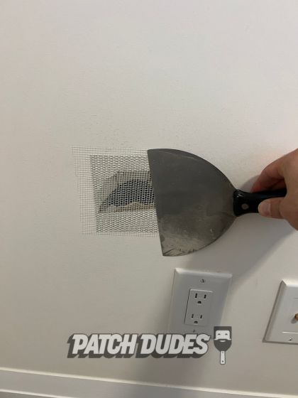 drywall hole repair in condo wall