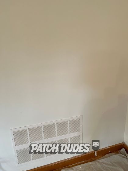 repairing hole in drywall for commercial studio