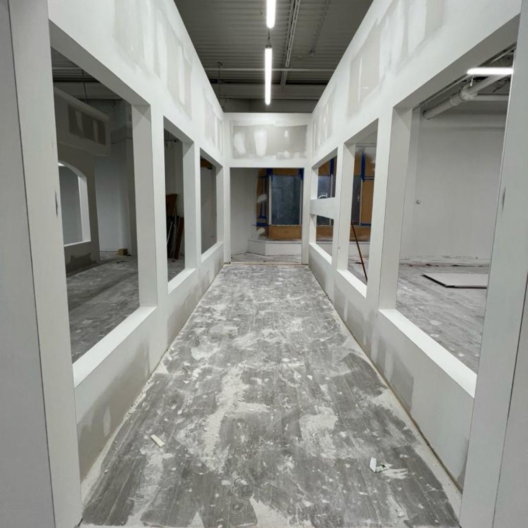 taping drywall patch dudes