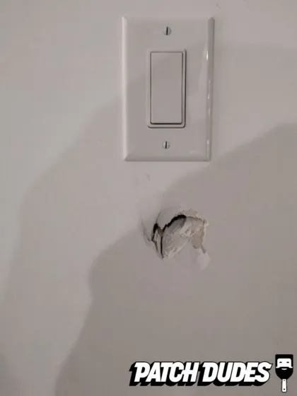 fixing drywall hole in media room