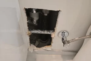 hole in drywall from plumbing work